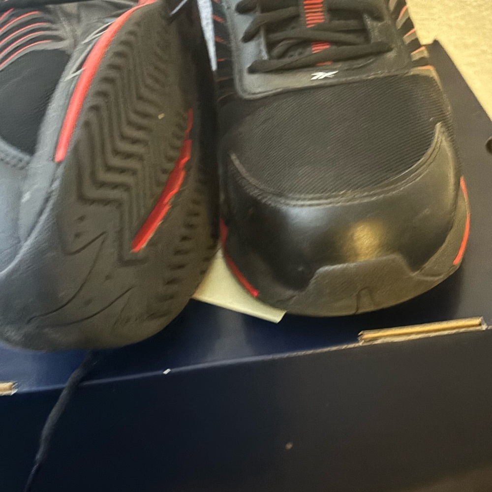 Reebok Black and Red Sneakers with Modern Design